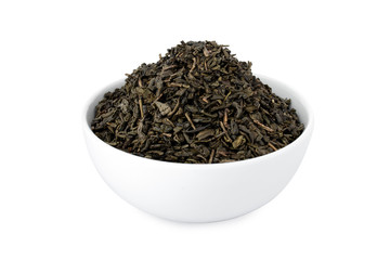 Gunpowder tea, green tea in white bowl, on white background (Tr- yesil cay)
