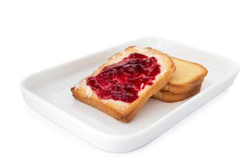 Double crispy biscotti with butter and jam, square cracker on white plate, on white background (Tr- recelli etimek)
