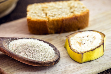 spoon with dry biological yeast, used in organic, vegetarian and vegan products. Healthy vegan life concept.