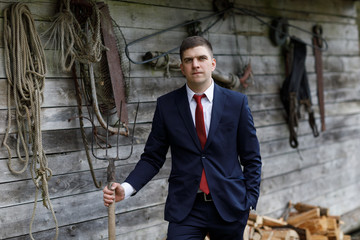 Fototapeta na wymiar businessman farmer. Portrait of a man in a business suit. 