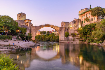 Fototapeta na wymiar Mostar Bridge at sunset time, an Ottoman bridge in Mostar, Bosnia and Herzegovina