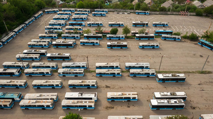 Many trolleybuses parked in front of the trolley depot hangar. Social transport. Vinnytsia, Ukraine, 2020