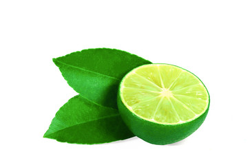 Slice half a fresh lime with sharp green leaves. Sour fruit, with shadows isolated on a white background