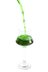 pouring cocktail in glass on white background