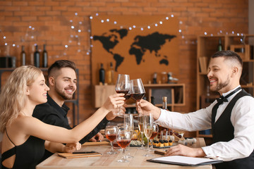 People tasting wine at the restaurant