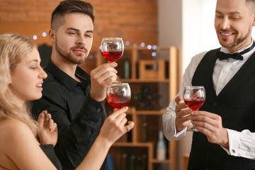 People tasting wine at the restaurant