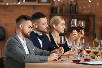 People tasting wine at the restaurant