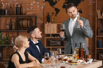 People tasting wine at the restaurant