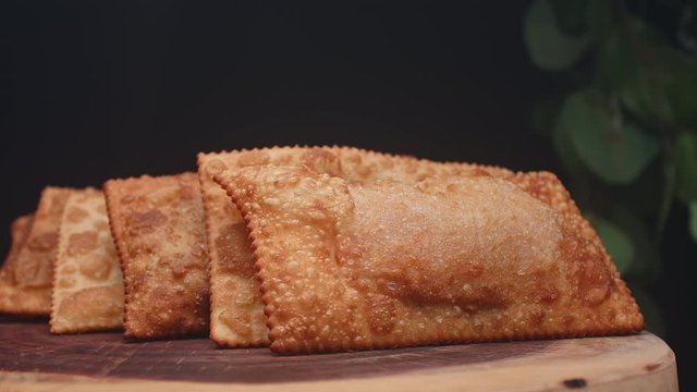 Fried pastry on a plate with different flavors
