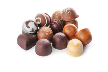 Delicious candies on white background