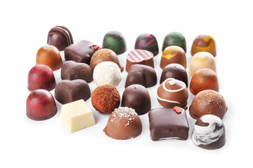 Delicious candies on white background