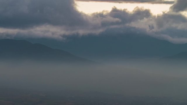 Dynamically moving clouds over the hill