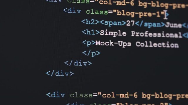 4K Close up shot HTML tag code on PC Monitor scroll down. Background concept for programming and coding web development.