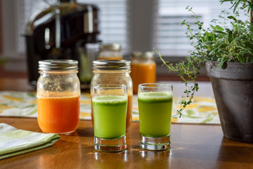 Fresh organic raw celery juice on the kitchen table