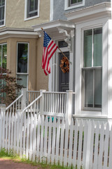 White picket fence adds to the Americana charm of this row house in the Logan neighborhood of Washington, DC.