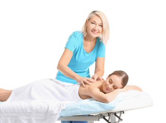 Obraz na płótnie Canvas Massage therapist working with female patient on white background
