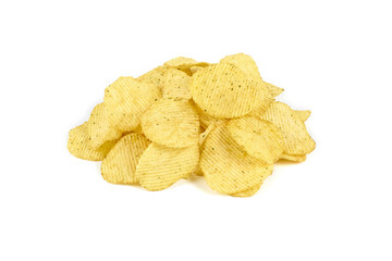 pile of yellow crispy ribbed potato chips isolated on white background