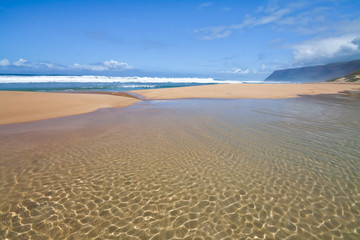 Queen's Pond Draining Into The Pacific Ocean With The Na Pali Cliffs in The Distance,  Polihale Beach, Polihale Beach State Park, Kauai, Hawaii, USA