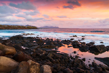 Sunrise on Lava Rock Shore at Ahukini Landing, Lihue, Kauai,Hawaii, USA
