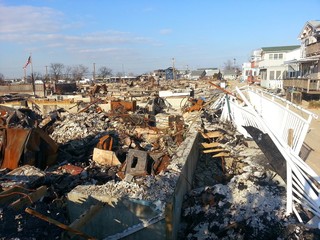 Hurricane devastation of homes and buildings after Hurricane Sandy a natural disaster which left...