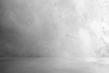 Black concrete background wall. Old surfaces that have scratches and cracks. Black room.	