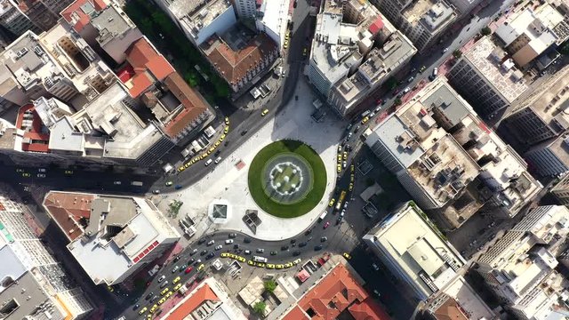 Aerial view 4k footage of renovated fountain of famous round square of Omonia, Attica, Greece