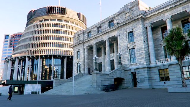 Walking past New Zealands Parlement building in Wellington on a sunny day