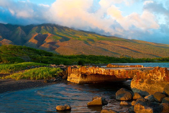 Old Kamalo Wharf With The Extinct Volcano,Kamakou,Kamao, Molakai, Hawaii, USA