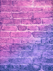 old brick wall with pink and purple tint