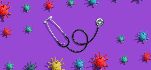 Coronavirus theme with a medical stethoscope on a solid background