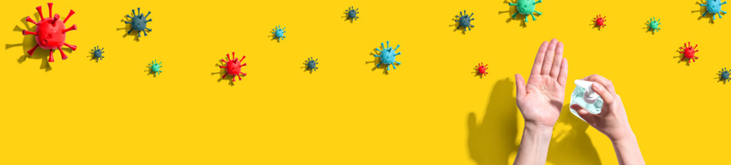 Applying sanitizer gel - healthcare and hygiene concept