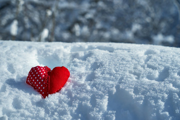 Fototapeta premium Image of soft toys in the snow. Handmade.