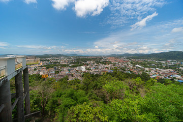 panoramic scene at Khao Rung Phuket viewpoint hilltop, home , building and green  tree. Sea and mountain long distance, beautiful cloudy blue sky background at day time, nature and travel concept..