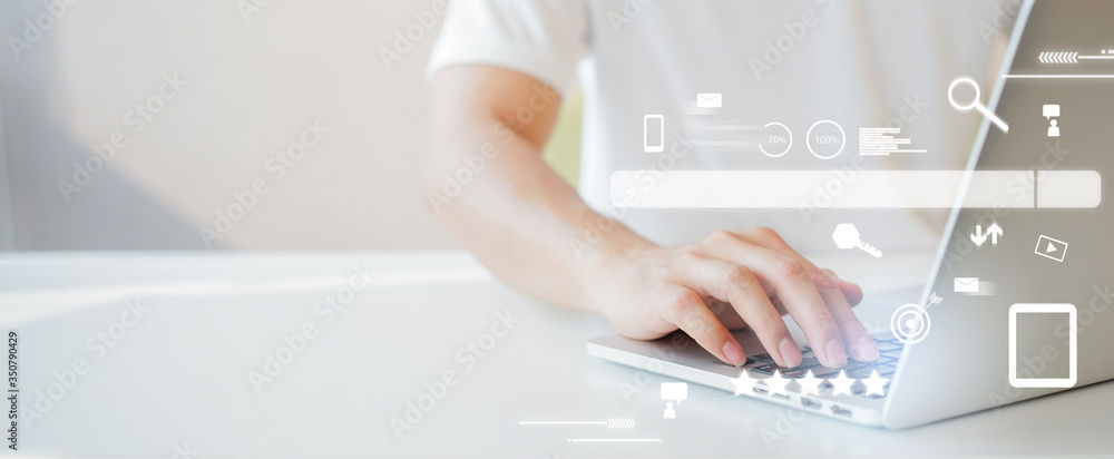Wall mural close up man hand type on keyboard laptop to use search engine optimization (seo) tools for finding 