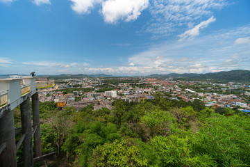 panoramic scene at Khao Rung Phuket viewpoint hilltop, home , building and green  tree. Sea and mountain long distance, beautiful cloudy blue sky background at day time, nature and travel concept..