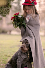 portrait of a child with a dog