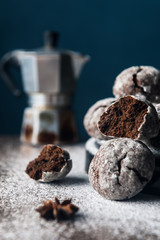 A few marble brown cookies close-up with powdered sugar