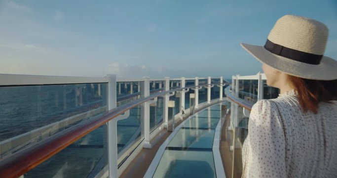 Young passenger on a ship on a sunny day. Shot on Black Magic Cinema Camera