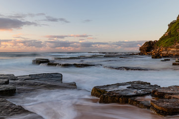 High tide wave water overflowing at Turimetta Beach, Sydney, Australia.