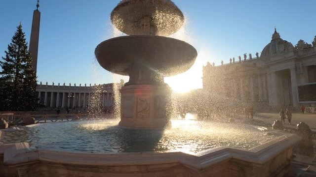 Silhouette of the fountain on the Saint Peter square outside the vatican at sunset. 4k