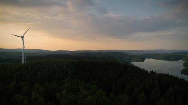 Windmill with lake in background