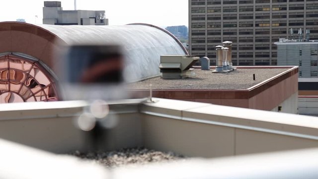 An Action Camera Placed On The Roof Deck - rack focus