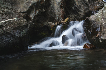 Beautiful waterfall of silky water going down the mountain