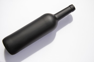 wine bottle matte isolated white background, copy space, blank for design, top view 
