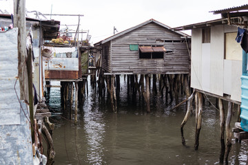 Fototapeta na wymiar floating wooden village on the coast of the capital of Papua New Guinea