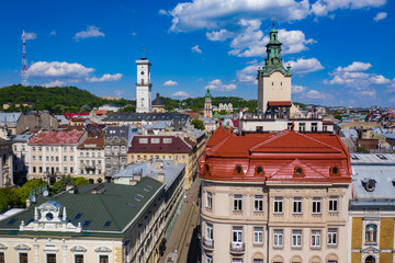 Obraz premium Aerial view on Jesuit Church, City Hall and Latin Cathedral in Lviv, Ukraine from drone