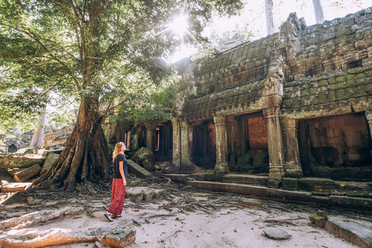 Cambodia. Angor Wat. Temple of the prom. A girl walks in ruins. Antiquity and man. Man and travel. Wisdom. Knowledge of ancestors