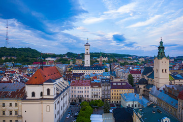 Obraz premium Aerial view on Jesuit Church, City Hall and Latin Cathedral in Lviv, Ukraine from drone