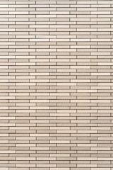 ベージュ色のタイル壁