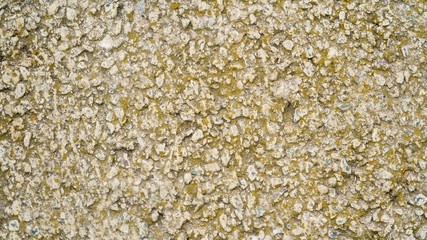 View from above. Background natural gray granite crushed stone, macadam. Macro photo of texture of broken stone or rubble with place for text